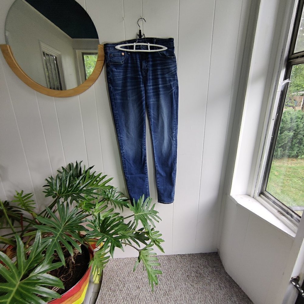 Jean by Amercan Eagle 32" x 34" AirFlex Jean, distressed but no tears.